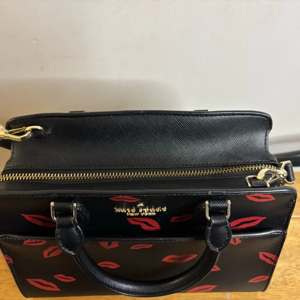 Kate Spade New York Madison Lip Toss small satchel in black saffiano leather